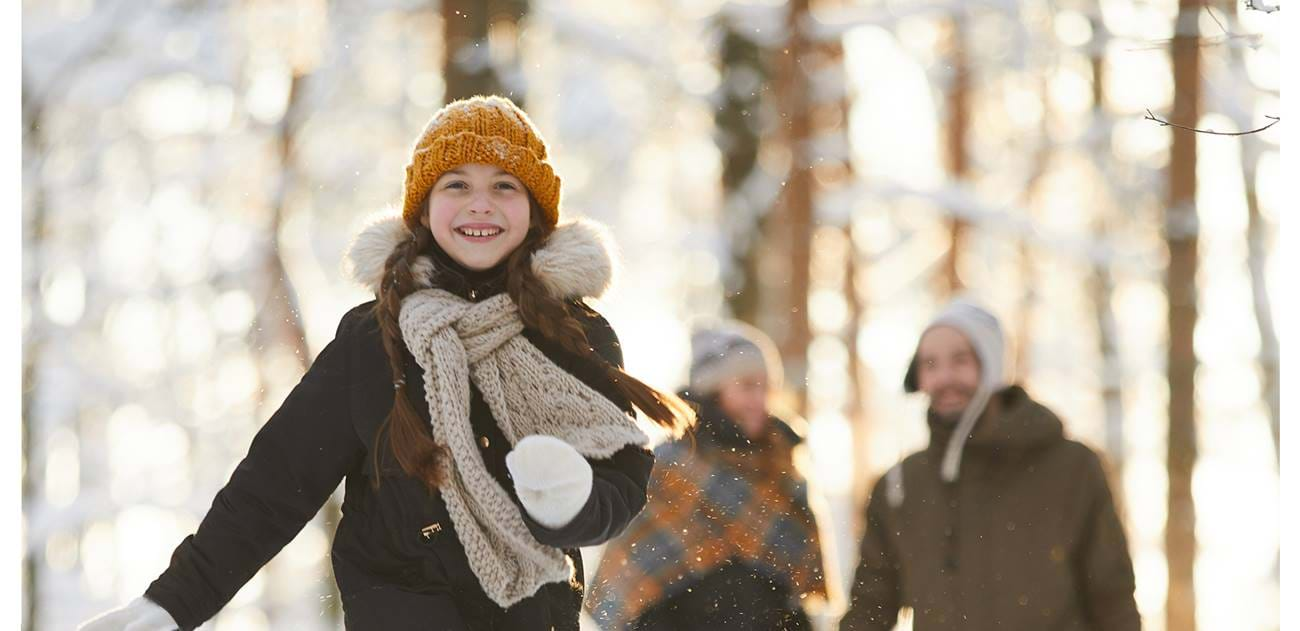 family in snow